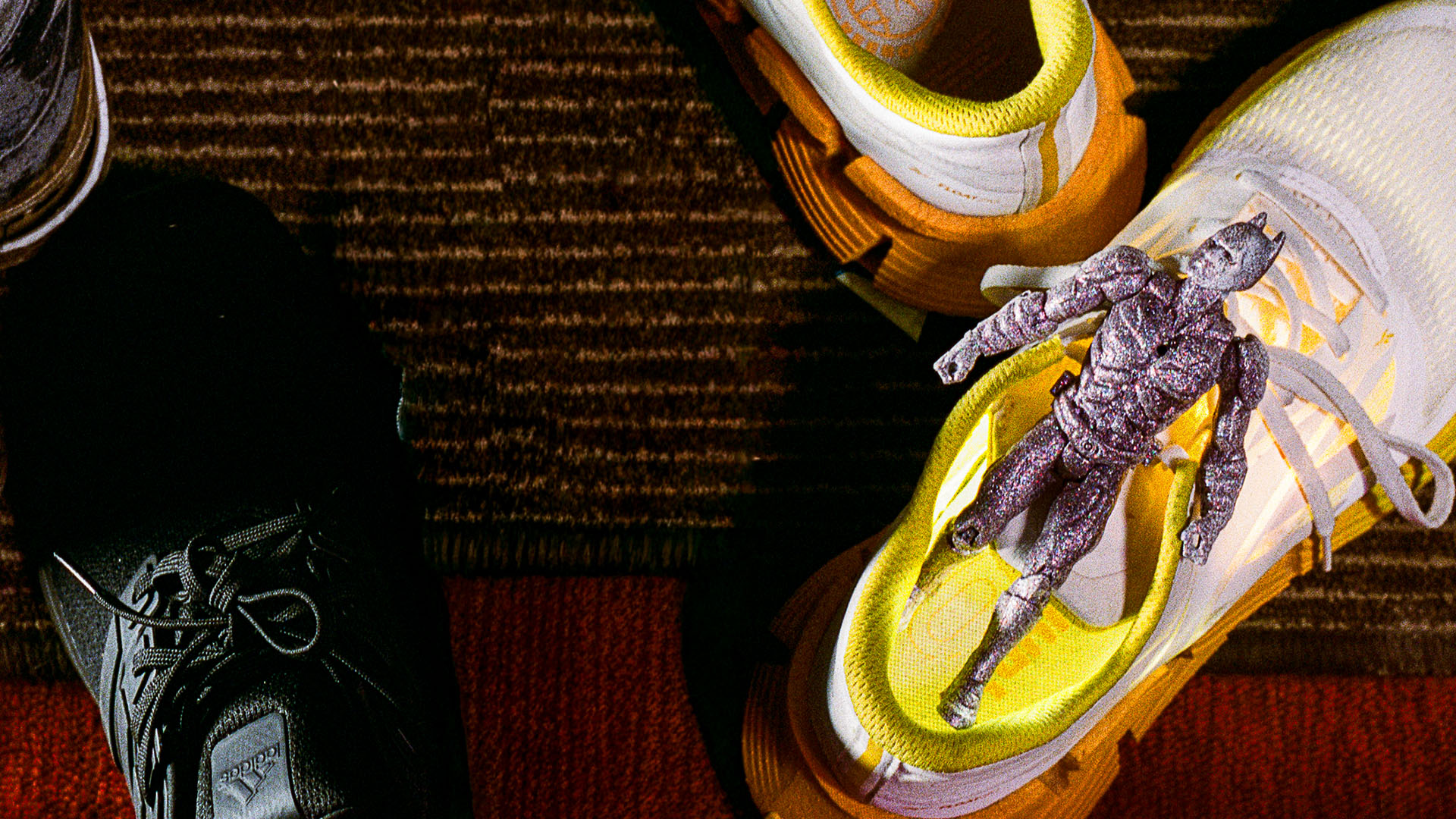 Person standing on rocks.